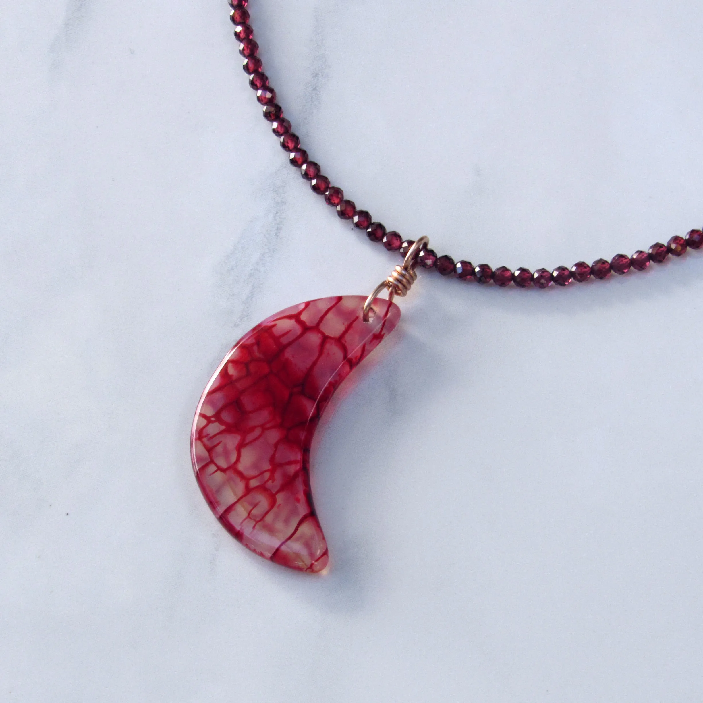 Dragon’s Vein’s Agate Moon Hand-wrapped Pendant w/ 14 Kt Rose Gold Filled on Garnets